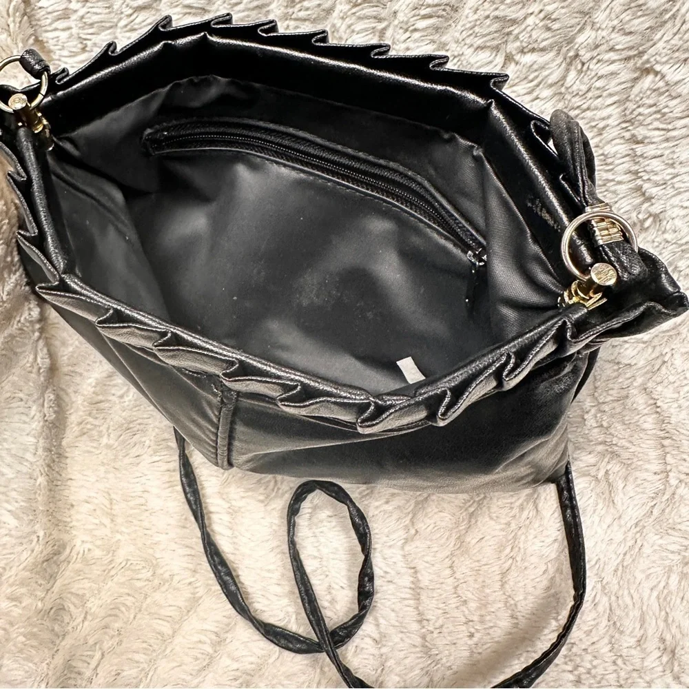 Vintage Chic Black Leather Clutch with strap, Metal inside makes diamond opening